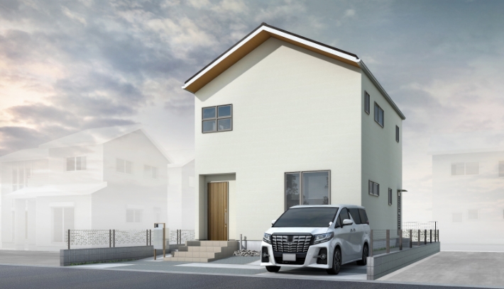 白い外壁の2階建て住宅と駐車スペース