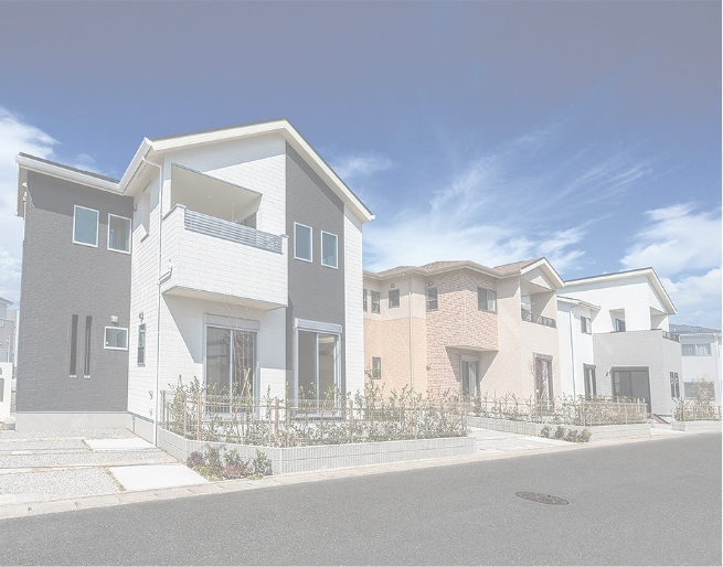 青空の下に並ぶ新築2階建て住宅群。